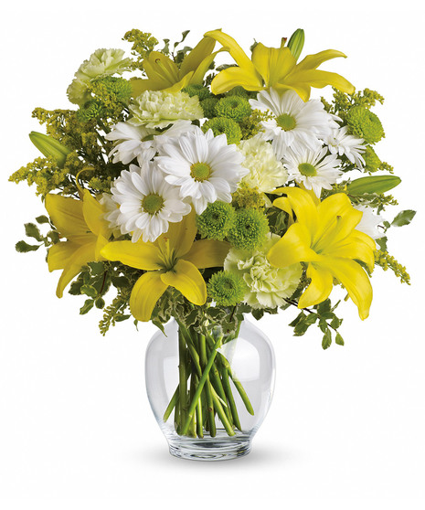 Collection of yellow flowers arranged in a classic ginger jar