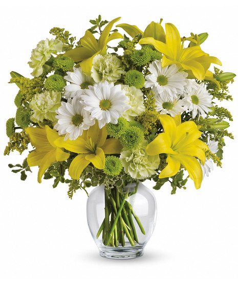 Collection of yellow flowers arranged in a classic ginger jar