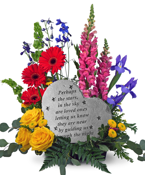 Image shows a stepping stone engraved with the message, 