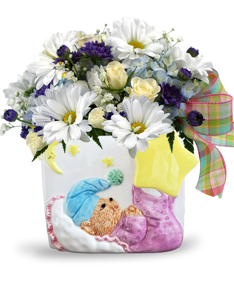 A baby themed floral arrangement displayed in a wind-up musical container that plays Twinkle Twinkle Little Star